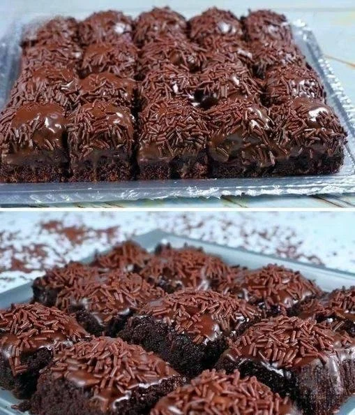 Delicious chocolate cake topped with brigadeiro, a Brazilian chocolate treat.